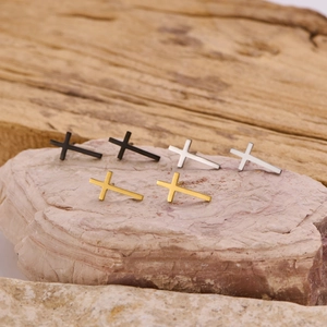 Minimalist stainless steel cross stud earrings set in gold, silver, and black finishes