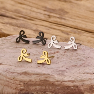 Three pairs of hollow ribbon bow stud earrings in black, silver, and gold stainless steel