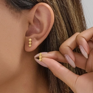 Minimalist geometric gold rhombus stud earrings for women with matte texture