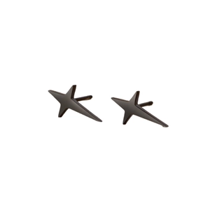 Minimalist matte black irregular star stud earrings with sharp geometric lines on white background
