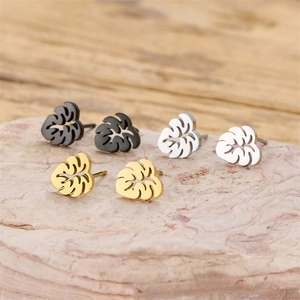 Three pairs of monstera leaf stud earrings in gold, silver, and matte black finish