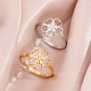 Adjustable stainless steel rings with hollow cherry blossom flower in gold and silver