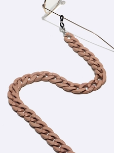 Detail of dusty pink acrylic eyewear chain with silver metal rings and rubber loops