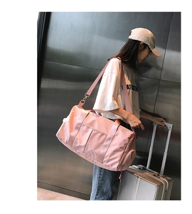 Pink waterproof yoga bag featuring a dedicated shoe compartment for fitness and travel