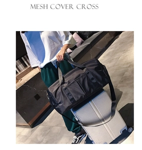 Detail showing the travel bag attached to luggage handle with multiple functional pockets
