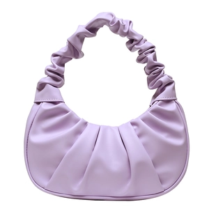 Detailed view of lavender PU leather ruched cloud bag with pleated handle and crescent shape