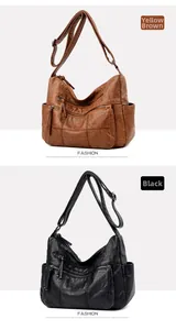 Detailed view of yellow-brown and black vintage hobo bags with front zipper pockets