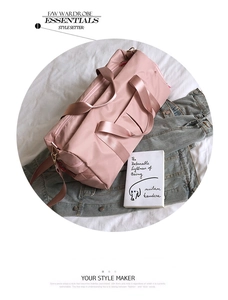 Pink yoga gym bag with shoe compartment and waterproof fabric on lifestyle background