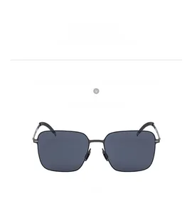 Detail of square polarized sunglasses with grey metal frame and nylon lenses