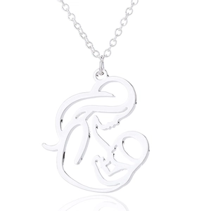 Close-up of minimalist silver mother and child pendant with polished mirror finish
