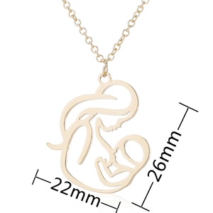 Gold mother and child silhouette pendant necklace measuring 22mm by 26mm