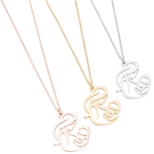 Detailed view of minimalist mother and baby necklaces in rose gold, gold, and silver finishes