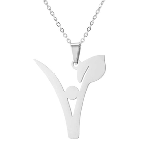 Close-up of silver stainless steel vegan leaf pendant necklace with cut-out detail