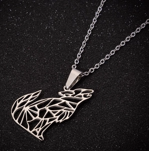 Detailed view of silver stainless steel geometric hollow wolf head pendant necklace