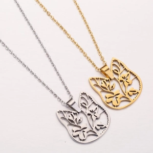 Hollow flower and leaf pendant necklaces in gold and silver stainless steel finishes