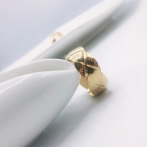 Classic wide gold plated stainless steel ring with elegant quilted matelassé engraving