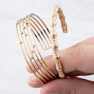 Luxury gold-plated layered titanium steel star bangle with micro rhinestones