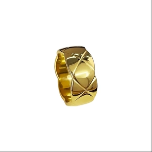 Classic wide gold stainless steel ring with quilted diamond pattern and mirror finish