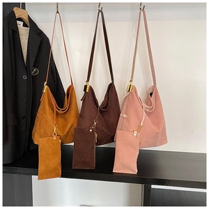 Suede fashion tote bags in yellow, brown, and rose pink with matching small pouch