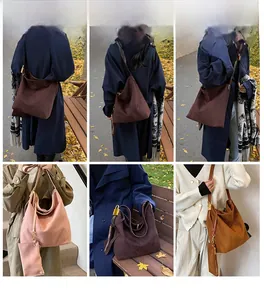 Hobo style shoulder bag in four colors with matching small pouch in various outdoor settings