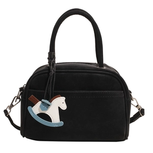 Retro black shell-shaped handbag with a colorful rocking horse pendant and matte finish