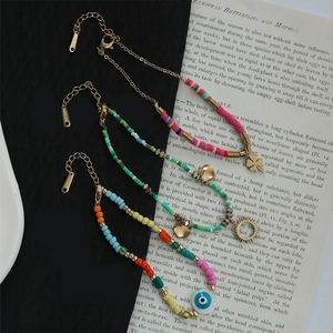 Bohemian colorful beaded bracelets with evil eye charms and stainless steel accents