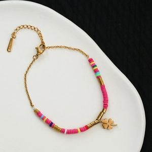 Bohemian stainless steel bracelet with colorful heishi beads and a gold clover pendant