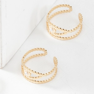 Detailed view of 14K gold plated open rings featuring round pearls and beaded edges