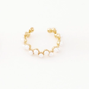 Detail of 14K gold plated ring with wave band and embedded small white pearls