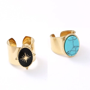 Adjustable stainless steel oval rings with black star pattern and turquoise stone