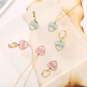 Parure collier et boucles d'oreilles cœur mauvais œil en acier doré inoxydable