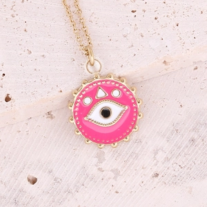 Pink enamel evil eye circle pendant necklace in gold plated finish on stone background