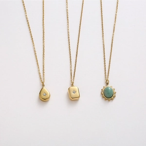 Minimalist gold teardrop and square pendant necklaces with green gemstone stone inlay
