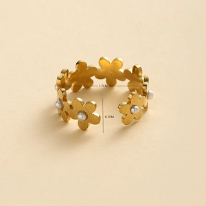 Detail view of golden flower ring with pearl accents and 1.7cm diameter dimension markers