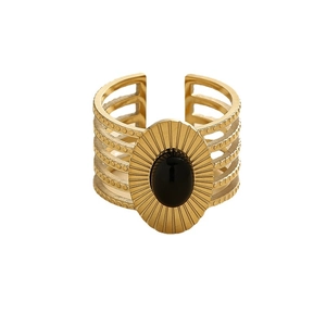 Vintage gold open ring with black oval stone and hollow multilayer band on white background