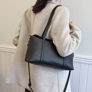 Minimalist black lychee pattern leather tote bag with silver hardware for women