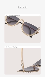 Détail de lunettes de soleil ondulées sans monture avec bordure en diamants et branches dorées