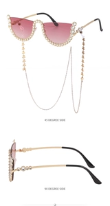 Détail de lunettes de soleil sans monture avec dégradé rose, cristaux et chaîne étoile