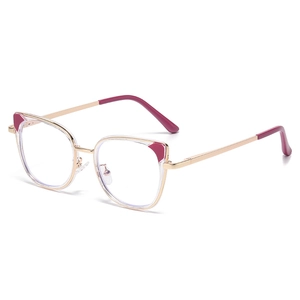 Fashion cat eye optical glasses in gold metal with purple accents on white background