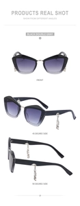 Détails de lunettes de soleil œil de chat noires avec pendentifs métalliques et verres dégradés