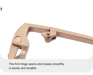 Detailed macro view of the durable rose gold metal hinges on these round frame sunglasses