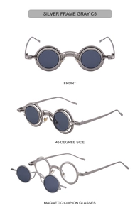 Detail view of steampunk magnetic clip-on sunglasses with silver metal frame and gray lenses