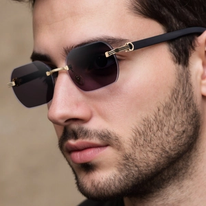 Lunettes de soleil sans monture pour hommes avec pont doré et verres dégradés gris