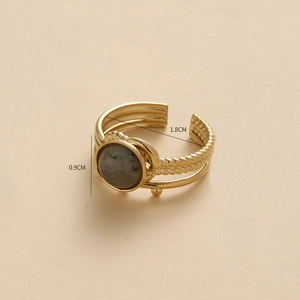 Vintage 14K gold open ring with round grey stone and braided rope band details