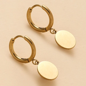 Detail of 14K gold plated hoop earrings with smooth oval drop charms on beige background
