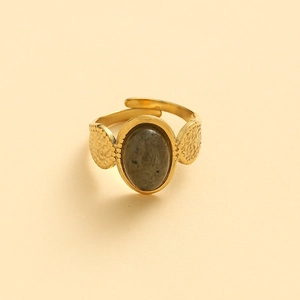 Golden oval gray stone ring with adjustable open band and hammered leaf design