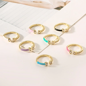 Set of colorful enamel open rings in gold finish with sparkling zircon stones
