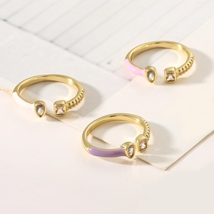 Three colorful enamel rings in white pink purple with cubic zirconia and adjustable band