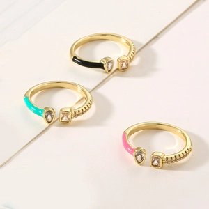 Detailed trio of copper gold-plated adjustable rings with colorful enamel and zircon stones