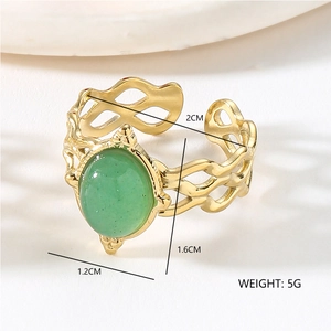 Detail view of gold hollow ring featuring oval green stone and exact dimensions